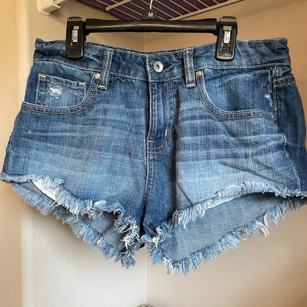 Low Rise Jean Shorts with distressed cutoffs size 6